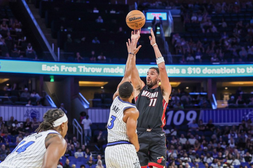 Klay Thompson shooting a three-pointer for the Heat in preseason