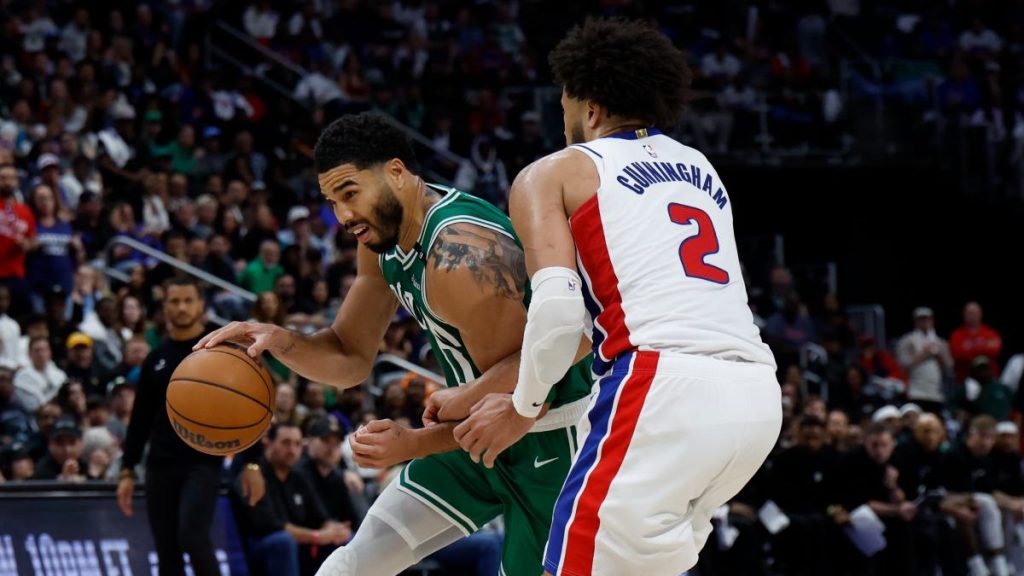 Jayson Tatum, guarded by Cade Cunningham in the first game of the 2025-26 season.