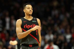 Lillard y McCollum combinan 66 puntos para doblegar a Utah