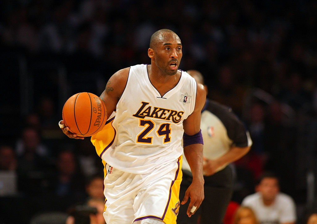LOS ANGELES, CA - DECEMBER 25: Kobe Bryant #24 of the Los Angeles Lakers dribbles the ball upcourt on the fastbreak against the Miami Heat during the NBA game at Staples Center on December 25, 2010 in Los Angeles, California. The Heat defeated the Lakers 96-80. NOTE TO USER: User expressly acknowledges and agrees that, by downloading and or using this photograph, User is consenting to the terms and conditions of the Getty Images License Agreement. (Photo by Victor Decolongon/Getty Images)