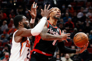 Damian Lillard quiere a DeAndre Ayton para sus Blazers