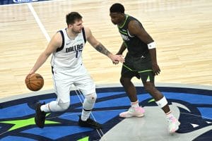 Luka Doncic y Anthony Edwards