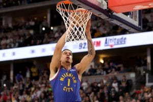 Michael Porter Jr. haciendo un mate contra los Pelicans
