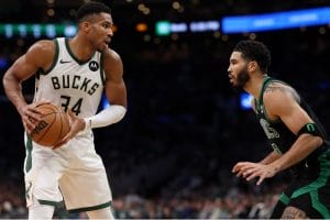 Giannis encara a Tatum