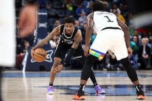 Ja Morant reta a Anthony Edwards