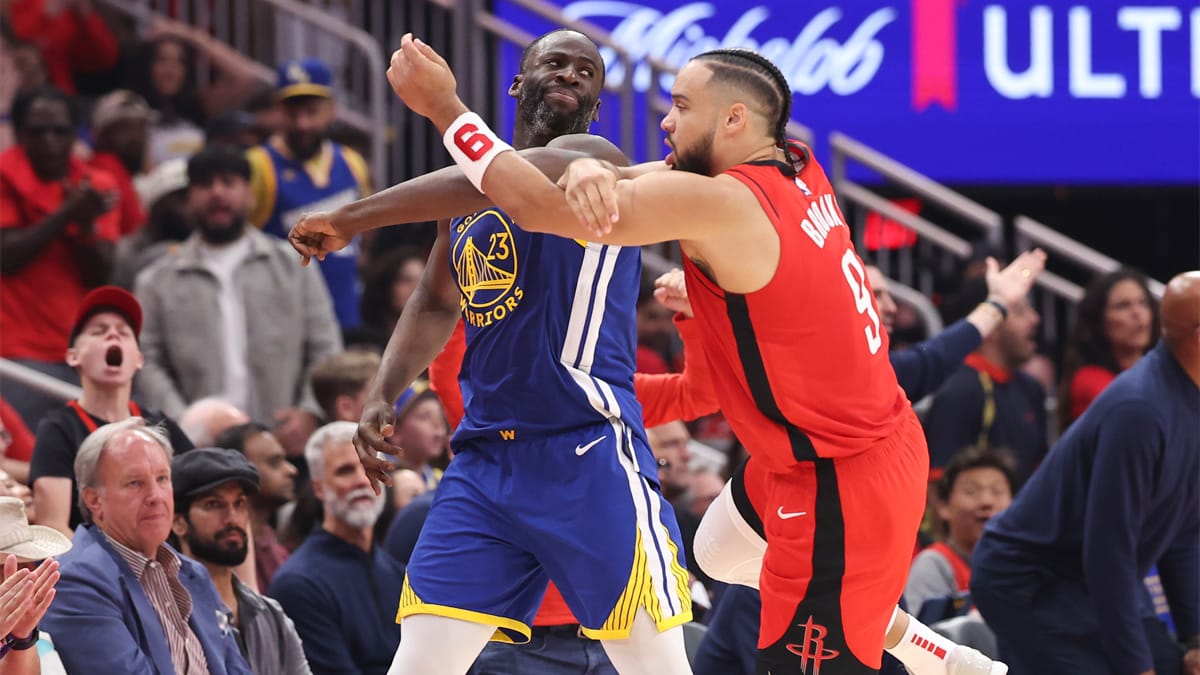 Dillon Brooks y Draymond Green en un partido