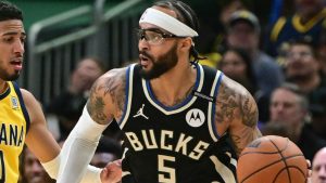 Gary Trent Jr., disputando un partido con Milwaukee Bucks.