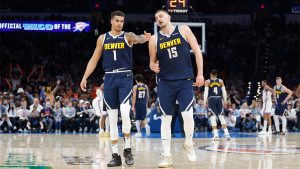 Nikola Jokic junto a Michael Porter Jr.